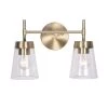 Delgato 2-Light Antique Brass Bathroom Vanity Light by Kenroy Home -Kenroy Home Sales antique brass and clear glass finish kenroy home vanity lighting 93982ab 64 1000