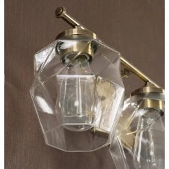 Ramona 22 in. 3-Light Antique Brass Vanity Light with Clear Glass Shades by Kenroy Home -Kenroy Home Sales antique brass kenroy home vanity lighting 94106ab fa 1000