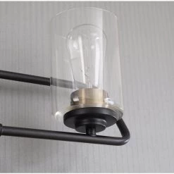 Carleigh 21 in. 3-Light Black and Antique Brass Vanity Light with Clear Glass Shades by Kenroy Home 10 Carleigh 21 in. 3-Light Black and Antique Brass Vanity Light with Clear Glass Shades by Kenroy Home -Kenroy Home Sales black and antique brass kenroy home vanity lighting 93986bl 1f 1000