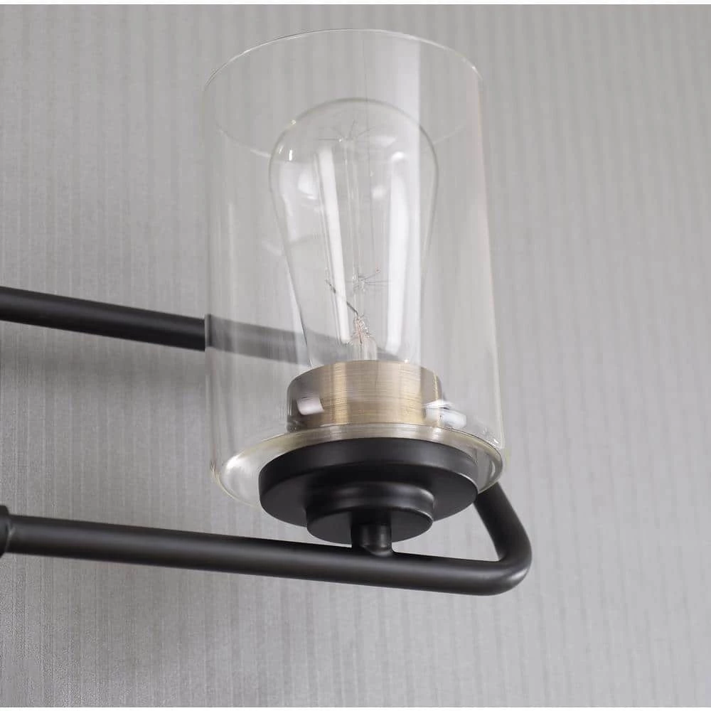 Carleigh 21 in. 3-Light Black and Antique Brass Vanity Light with Clear Glass Shades by Kenroy Home 6 Carleigh 21 in. 3-Light Black and Antique Brass Vanity Light with Clear Glass Shades by Kenroy Home - Image 4