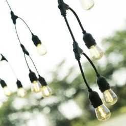 Fence 27.5 ft. Plug-In S14 Bulbs String Light by OVE Decors -Kenroy Home Sales black ove decors string lights 15lst fenc28 rb c3 1000