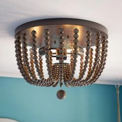 Dumas 15.75 in. 3-Light Golden Bronze Wood Bead Flush Mount Light by Kenroy Home 13 Dumas 15.75 in. 3-Light Golden Bronze Wood Bead Flush Mount Light by Kenroy Home -Kenroy Home Sales golden bronze finish with gray wood beads kenroy home flush mount lights 93134gbrz 44 1000