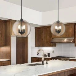 Lassie 3-Light Painted Black Globe Pendant Light with Glass Shade by OVE Decors 17 Lassie 3-Light Painted Black Globe Pendant Light with Glass Shade by OVE Decors -Kenroy Home Sales painted black ove decors chandeliers 15lpe lass12 pb 31 1000